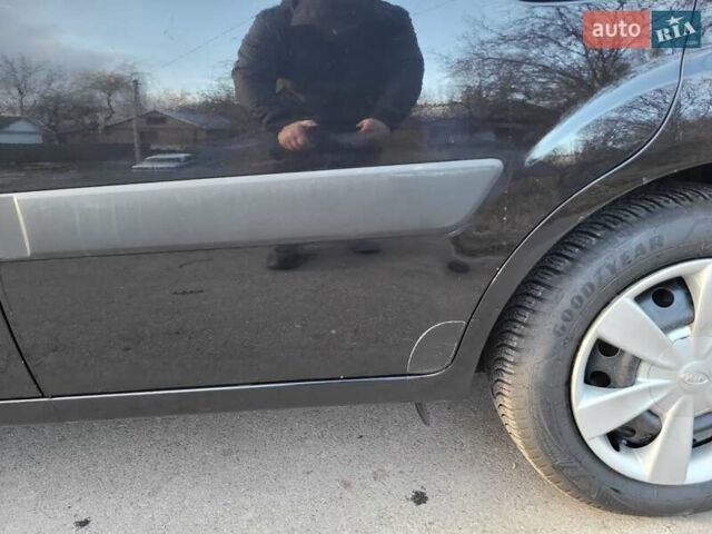 Чорний Кіа Ріо, об'ємом двигуна 1.4 л та пробігом 184 тис. км за 4800 $, фото 37 на Automoto.ua