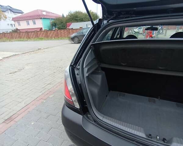Черный Киа Рио, объемом двигателя 1.4 л и пробегом 203 тыс. км за 4499 $, фото 56 на Automoto.ua