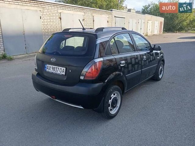 Черный Киа Рио, объемом двигателя 1.4 л и пробегом 153 тыс. км за 3600 $, фото 2 на Automoto.ua