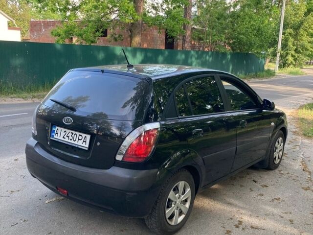 Чорний Кіа Ріо, об'ємом двигуна 1.4 л та пробігом 227 тис. км за 4800 $, фото 5 на Automoto.ua