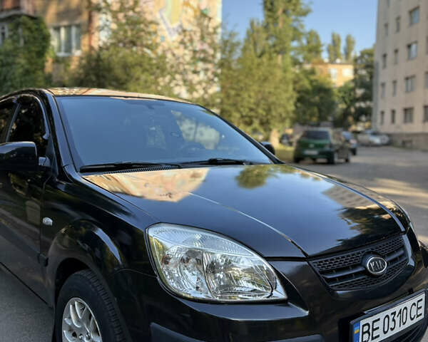 Чорний Кіа Ріо, об'ємом двигуна 1.4 л та пробігом 215 тис. км за 6200 $, фото 5 на Automoto.ua