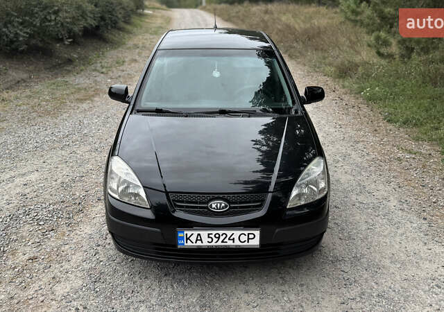 Чорний Кіа Ріо, об'ємом двигуна 1.4 л та пробігом 230 тис. км за 5650 $, фото 13 на Automoto.ua
