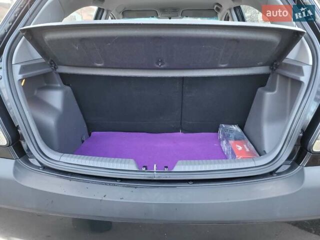 Чорний Кіа Ріо, об'ємом двигуна 1.4 л та пробігом 184 тис. км за 4800 $, фото 44 на Automoto.ua