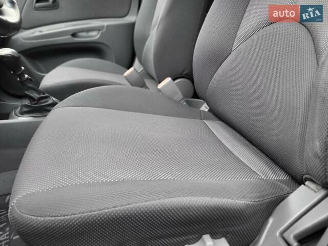 Черный Киа Рио, объемом двигателя 1.4 л и пробегом 184 тыс. км за 4999 $, фото 35 на Automoto.ua