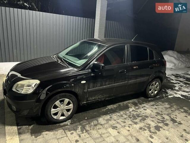 Чорний Кіа Ріо, об'ємом двигуна 1.4 л та пробігом 152 тис. км за 4500 $, фото 4 на Automoto.ua