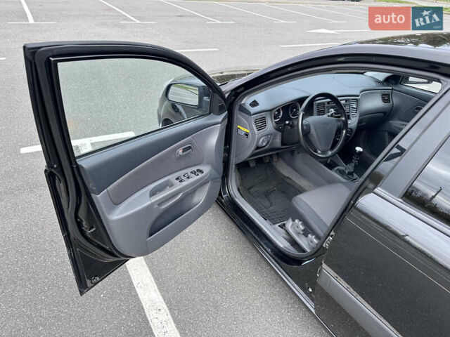 Черный Киа Рио, объемом двигателя 1.4 л и пробегом 158 тыс. км за 5000 $, фото 23 на Automoto.ua