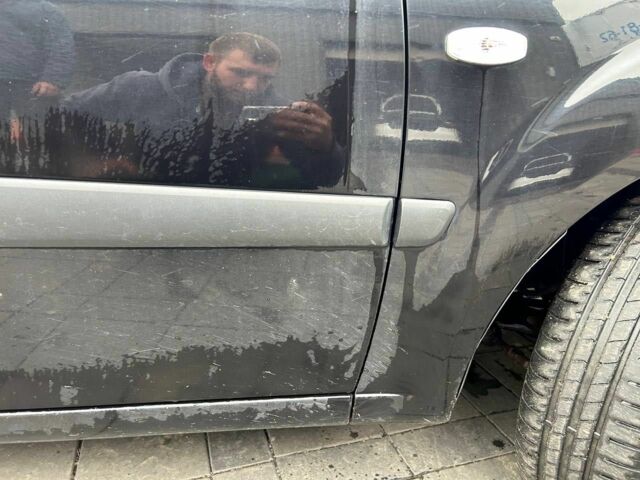 Чорний Кіа Ріо, об'ємом двигуна 1.4 л та пробігом 207 тис. км за 3952 $, фото 9 на Automoto.ua