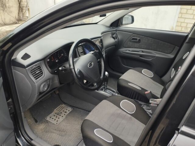 Черный Киа Рио, объемом двигателя 1.4 л и пробегом 110 тыс. км за 6156 $, фото 4 на Automoto.ua