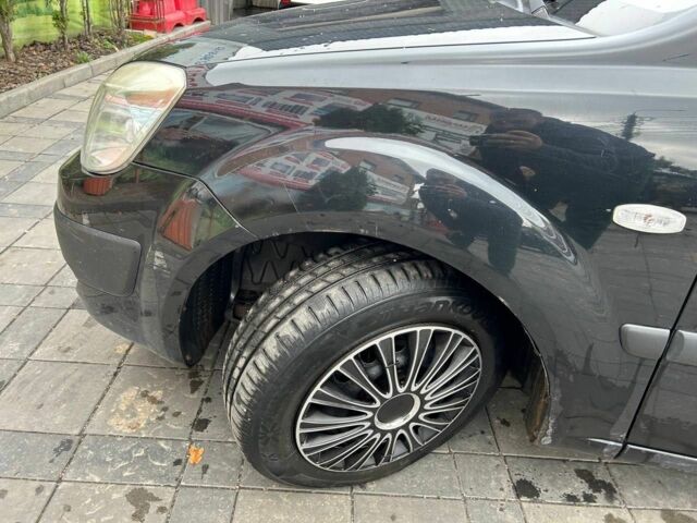 Чорний Кіа Ріо, об'ємом двигуна 1.4 л та пробігом 207 тис. км за 3952 $, фото 18 на Automoto.ua