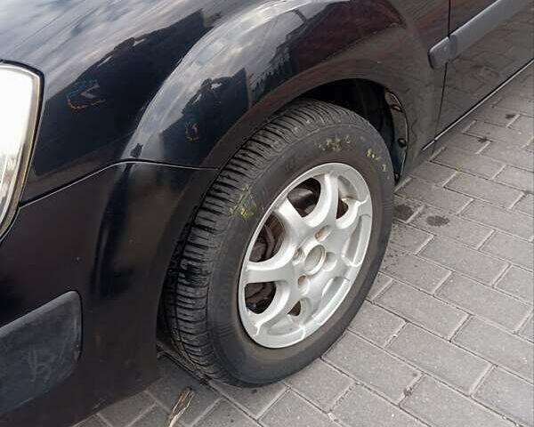 Черный Киа Рио, объемом двигателя 1.4 л и пробегом 203 тыс. км за 4499 $, фото 10 на Automoto.ua