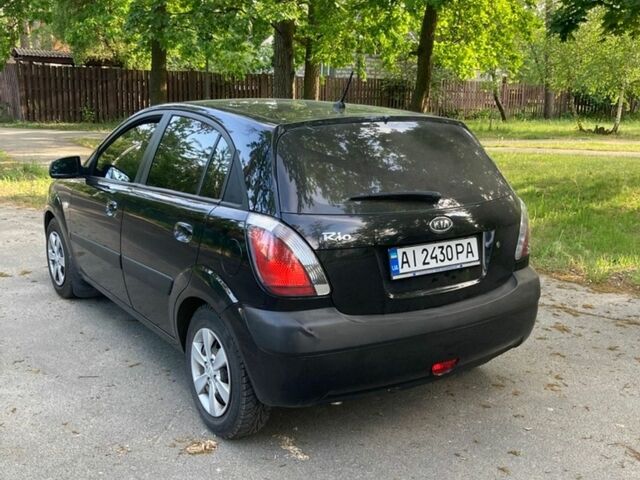 Чорний Кіа Ріо, об'ємом двигуна 1.4 л та пробігом 227 тис. км за 4800 $, фото 4 на Automoto.ua