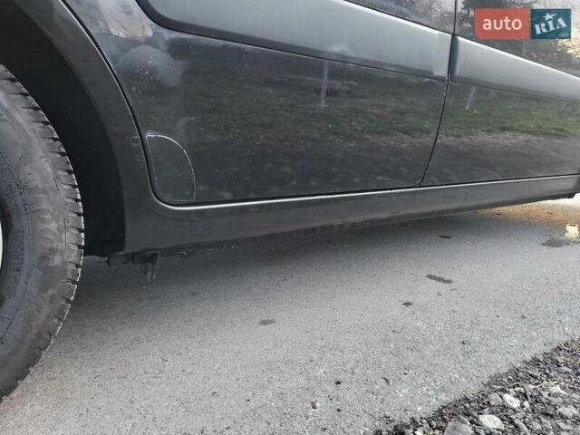 Чорний Кіа Ріо, об'ємом двигуна 1.4 л та пробігом 184 тис. км за 4800 $, фото 42 на Automoto.ua