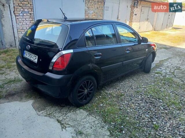 Чорний Кіа Ріо, об'ємом двигуна 1.4 л та пробігом 235 тис. км за 4900 $, фото 2 на Automoto.ua