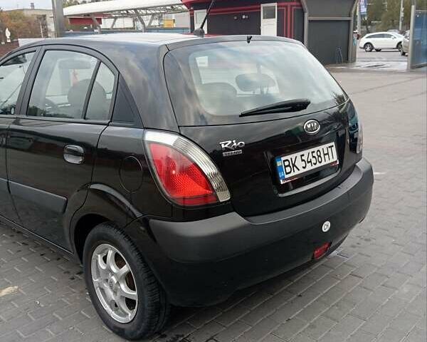 Черный Киа Рио, объемом двигателя 1.4 л и пробегом 203 тыс. км за 4499 $, фото 31 на Automoto.ua