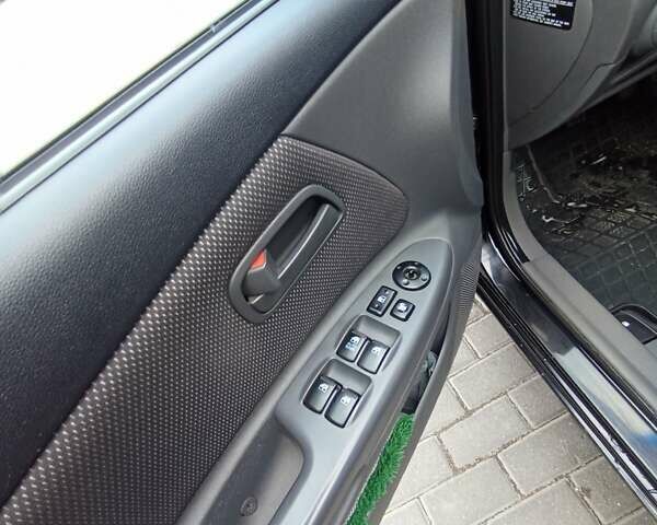 Черный Киа Рио, объемом двигателя 1.4 л и пробегом 203 тыс. км за 4499 $, фото 50 на Automoto.ua