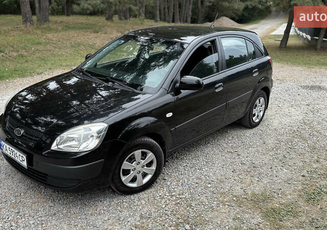 Чорний Кіа Ріо, об'ємом двигуна 1.4 л та пробігом 230 тис. км за 5650 $, фото 14 на Automoto.ua