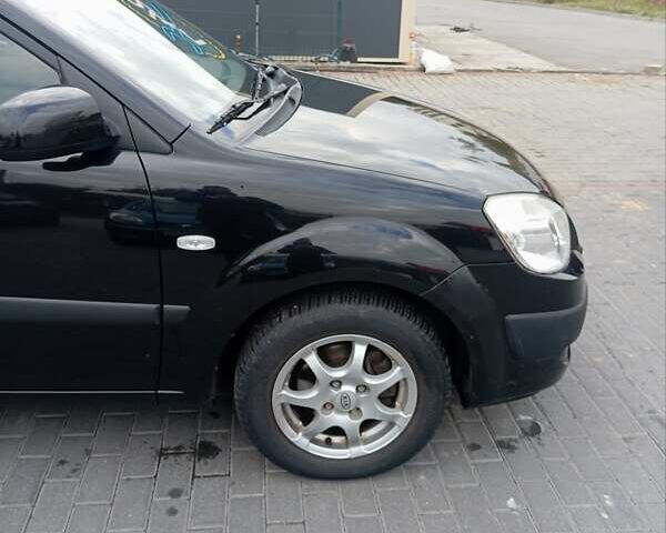 Черный Киа Рио, объемом двигателя 1.4 л и пробегом 203 тыс. км за 4499 $, фото 21 на Automoto.ua