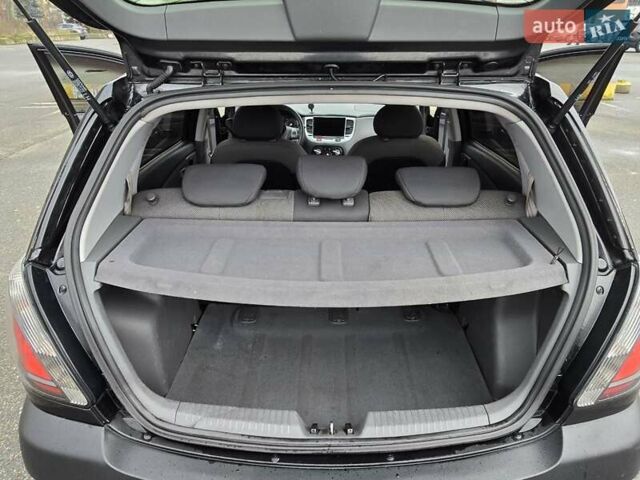 Черный Киа Рио, объемом двигателя 1.4 л и пробегом 250 тыс. км за 4300 $, фото 19 на Automoto.ua