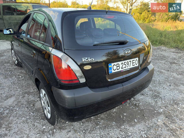 Черный Киа Рио, объемом двигателя 1.4 л и пробегом 156 тыс. км за 5300 $, фото 6 на Automoto.ua