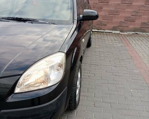Черный Киа Рио, объемом двигателя 1.4 л и пробегом 203 тыс. км за 4499 $, фото 4 на Automoto.ua