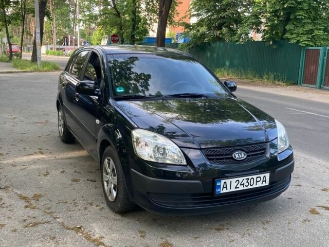 Чорний Кіа Ріо, об'ємом двигуна 1.4 л та пробігом 227 тис. км за 4800 $, фото 1 на Automoto.ua