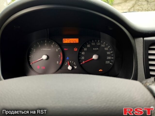 Черный Киа Рио, объемом двигателя 1.4 л и пробегом 110 тыс. км за 6399 $, фото 5 на Automoto.ua