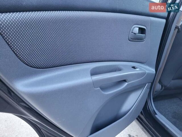 Чорний Кіа Ріо, об'ємом двигуна 1.4 л та пробігом 184 тис. км за 4800 $, фото 12 на Automoto.ua