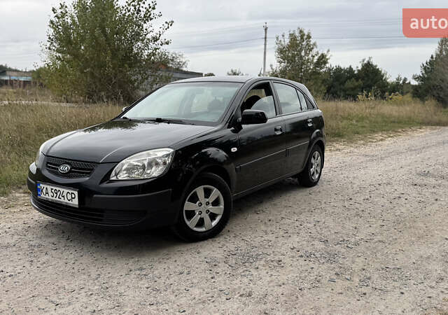 Чорний Кіа Ріо, об'ємом двигуна 1.4 л та пробігом 230 тис. км за 5650 $, фото 12 на Automoto.ua