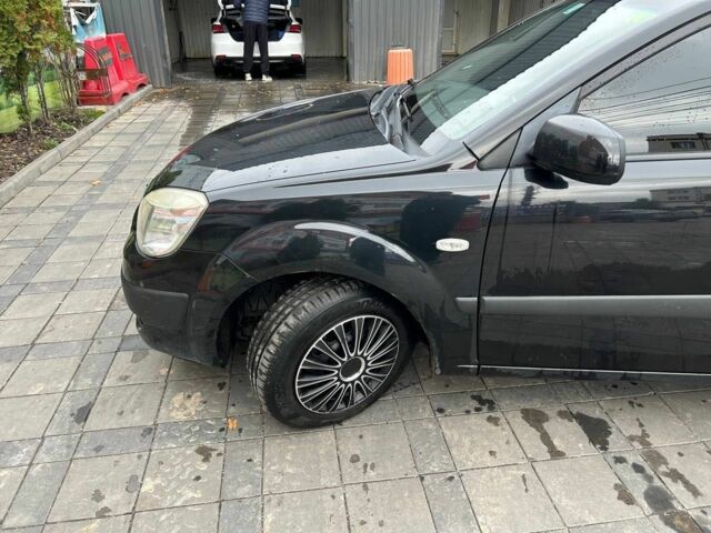 Чорний Кіа Ріо, об'ємом двигуна 1.4 л та пробігом 207 тис. км за 3952 $, фото 1 на Automoto.ua