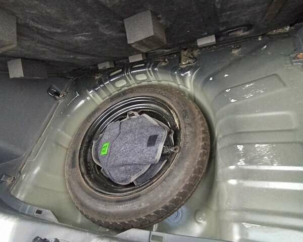 Черный Киа Рио, объемом двигателя 1.4 л и пробегом 203 тыс. км за 4499 $, фото 66 на Automoto.ua
