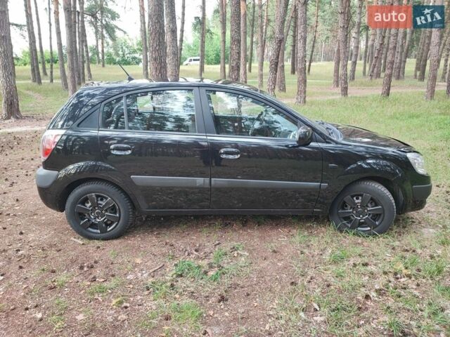 Чорний Кіа Ріо, об'ємом двигуна 1.34 л та пробігом 167 тис. км за 5000 $, фото 3 на Automoto.ua