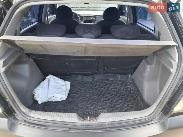 Черный Киа Рио, объемом двигателя 1.4 л и пробегом 220 тыс. км за 4500 $, фото 4 на Automoto.ua