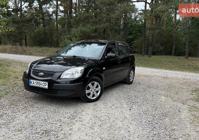 Чорний Кіа Ріо, об'ємом двигуна 1.4 л та пробігом 230 тис. км за 5650 $, фото 5 на Automoto.ua