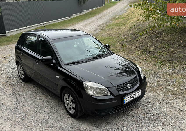 Чорний Кіа Ріо, об'ємом двигуна 1.4 л та пробігом 230 тис. км за 5650 $, фото 15 на Automoto.ua