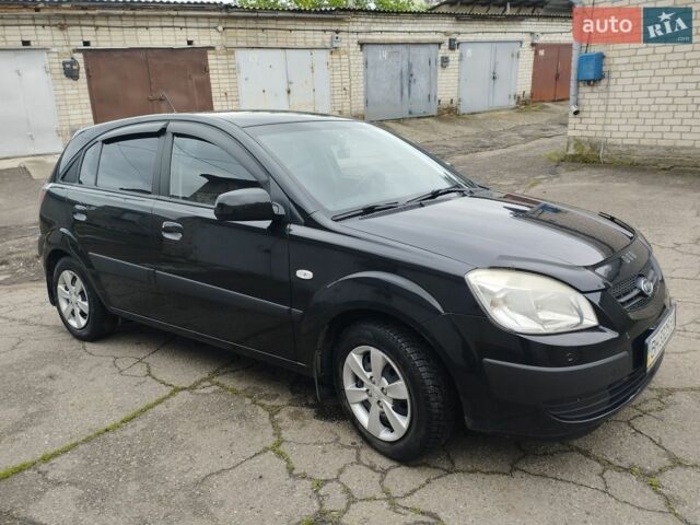 Черный Киа Рио, объемом двигателя 1.4 л и пробегом 110 тыс. км за 5999 $, фото 2 на Automoto.ua