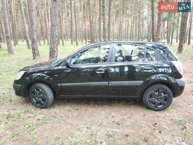 Чорний Кіа Ріо, об'ємом двигуна 1.34 л та пробігом 167 тис. км за 5000 $, фото 4 на Automoto.ua