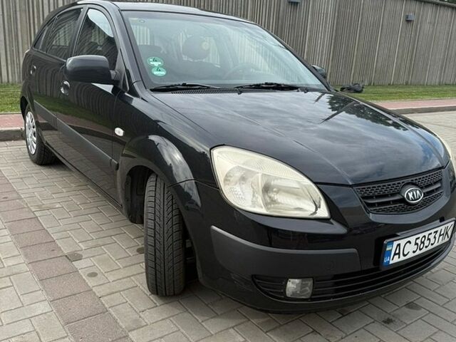 Черный Киа Рио, объемом двигателя 1.4 л и пробегом 230 тыс. км за 4400 $, фото 1 на Automoto.ua