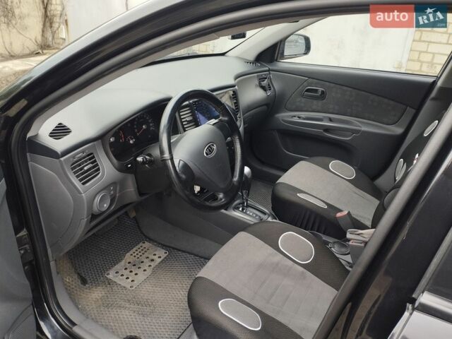 Черный Киа Рио, объемом двигателя 1.4 л и пробегом 110 тыс. км за 5999 $, фото 4 на Automoto.ua