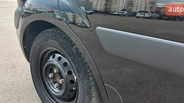 Черный Киа Рио, объемом двигателя 1.4 л и пробегом 144 тыс. км за 4600 $, фото 6 на Automoto.ua