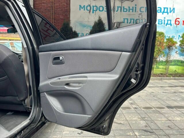 Чорний Кіа Ріо, об'ємом двигуна 1.4 л та пробігом 207 тис. км за 3952 $, фото 13 на Automoto.ua