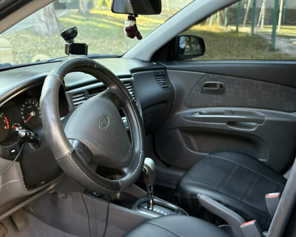 Чорний Кіа Ріо, об'ємом двигуна 1.4 л та пробігом 215 тис. км за 6200 $, фото 10 на Automoto.ua
