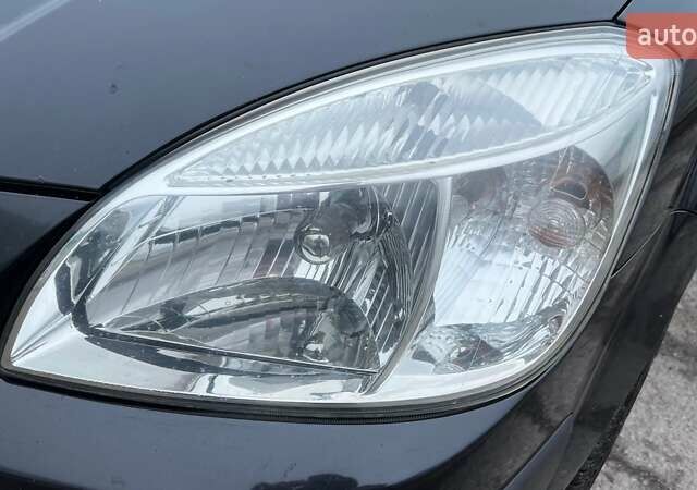 Черный Киа Рио, объемом двигателя 1.6 л и пробегом 230 тыс. км за 4900 $, фото 18 на Automoto.ua