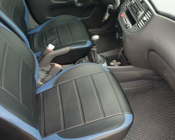 Чорний Кіа Ріо, об'ємом двигуна 1.4 л та пробігом 173 тис. км за 5250 $, фото 8 на Automoto.ua