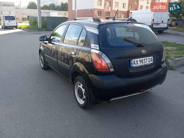 Черный Киа Рио, объемом двигателя 1.4 л и пробегом 153 тыс. км за 3600 $, фото 1 на Automoto.ua