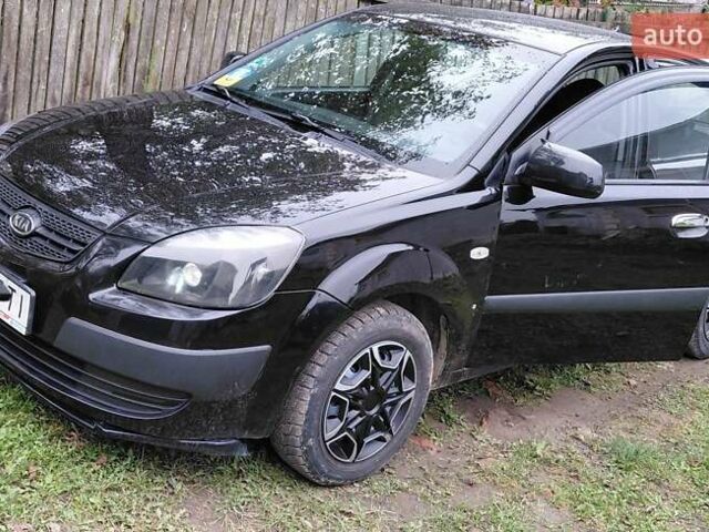 Черный Киа Рио, объемом двигателя 1.4 л и пробегом 293 тыс. км за 4500 $, фото 12 на Automoto.ua