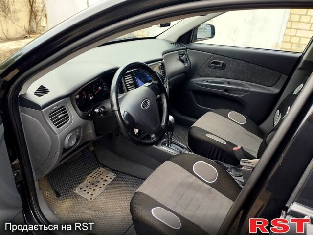 Черный Киа Рио, объемом двигателя 1.4 л и пробегом 110 тыс. км за 6399 $, фото 3 на Automoto.ua