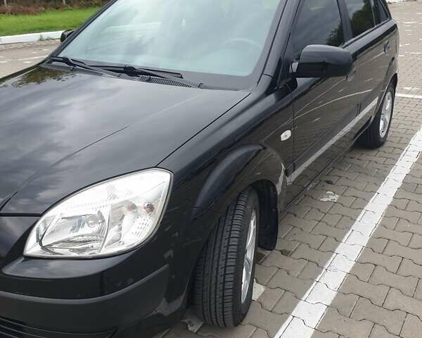Чорний Кіа Ріо, об'ємом двигуна 1.4 л та пробігом 173 тис. км за 5250 $, фото 27 на Automoto.ua