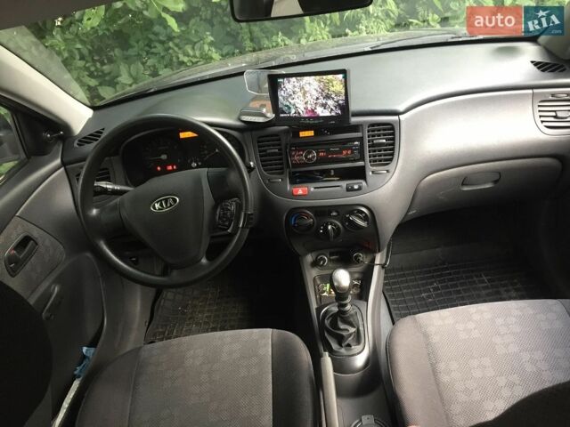 Чорний Кіа Ріо, об'ємом двигуна 1.4 л та пробігом 270 тис. км за 3600 $, фото 7 на Automoto.ua