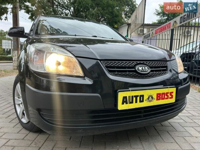 Чорний Кіа Ріо, об'ємом двигуна 1.4 л та пробігом 260 тис. км за 4800 $, фото 3 на Automoto.ua