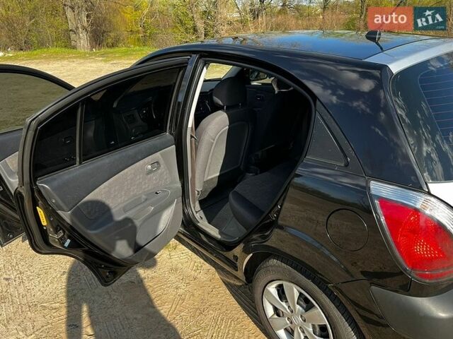Черный Киа Рио, объемом двигателя 1.4 л и пробегом 103 тыс. км за 3400 $, фото 15 на Automoto.ua
